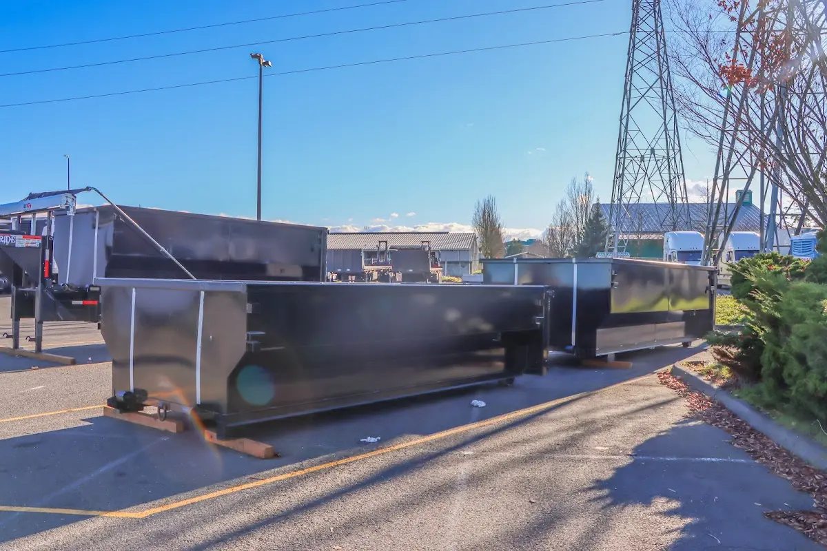 Roll-off dumpster ready for waste disposal at job site for Construction Dumpster Rental in Bayshore Gardens